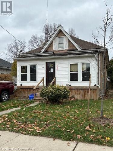 Bungalow-style house featuring a front yard - 64 Pollock Avenue, Cambridge, ON - Outdoor