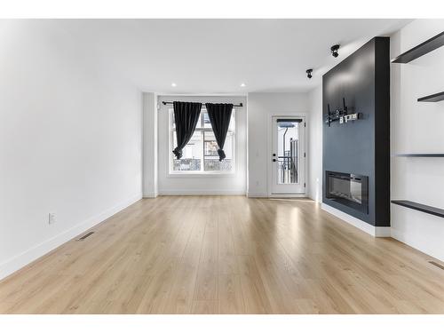 48 16467 23A Avenue, Surrey, BC - Indoor Photo Showing Living Room With Fireplace