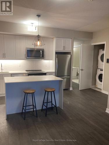 210 - 50 Ann Street, Caledon, ON - Indoor Photo Showing Kitchen With Stainless Steel Kitchen