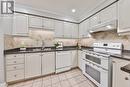 35 - 3050 Orleans Road, Mississauga, ON  - Indoor Photo Showing Kitchen With Double Sink 