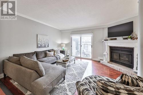 35 - 3050 Orleans Road, Mississauga, ON - Indoor Photo Showing Living Room With Fireplace