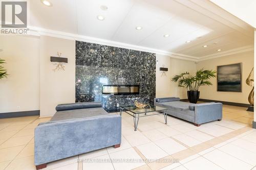 502 - 50 Disera Drive, Vaughan, ON - Indoor Photo Showing Living Room With Fireplace