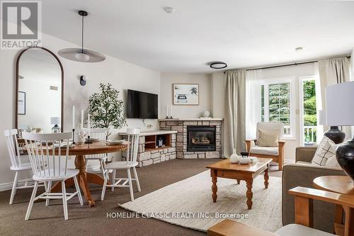 2108-09 - 90 Highland Drive N, Oro-Medonte, ON - Indoor Photo Showing Living Room With Fireplace