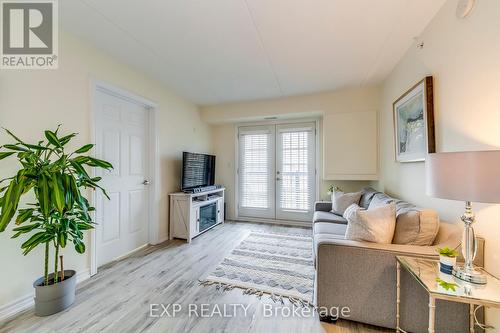 309 - 1380 Main Street E, Milton, ON - Indoor Photo Showing Living Room