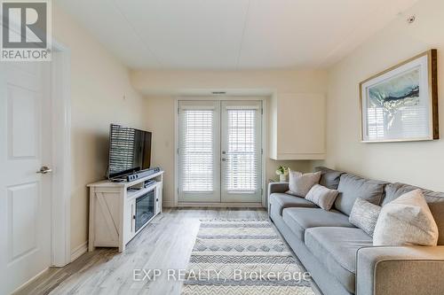 309 - 1380 Main Street E, Milton, ON - Indoor Photo Showing Living Room