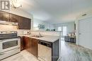 309 - 1380 Main Street E, Milton, ON  - Indoor Photo Showing Kitchen With Double Sink 