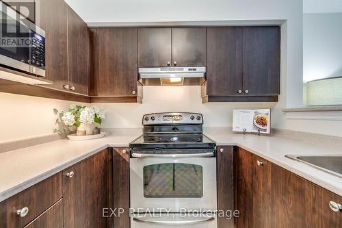 309 - 1380 Main Street E, Milton, ON - Indoor Photo Showing Kitchen