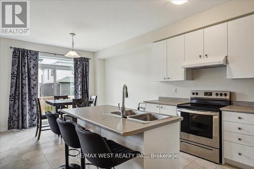 17 Wintergreen Crescent, Haldimand, ON - Indoor Photo Showing Kitchen With Stainless Steel Kitchen With Double Sink