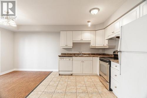 10 - 688 Exeter Road, London, ON - Indoor Photo Showing Kitchen With Double Sink