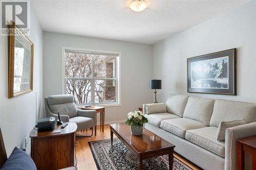 2101, 303 Arbour Crest Drive Nw, Calgary, AB - Indoor Photo Showing Living Room