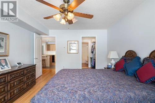 2101, 303 Arbour Crest Drive Nw, Calgary, AB - Indoor Photo Showing Bedroom