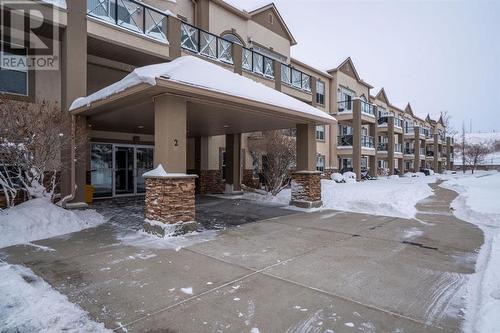 2101, 303 Arbour Crest Drive Nw, Calgary, AB - Outdoor With Facade