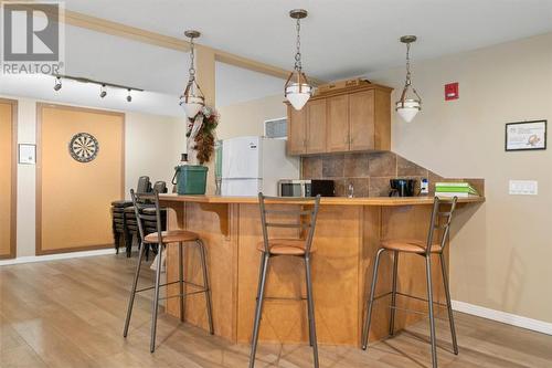 2101, 303 Arbour Crest Drive Nw, Calgary, AB - Indoor Photo Showing Kitchen