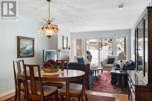 2101, 303 Arbour Crest Drive Nw, Calgary, AB - Indoor Photo Showing Dining Room