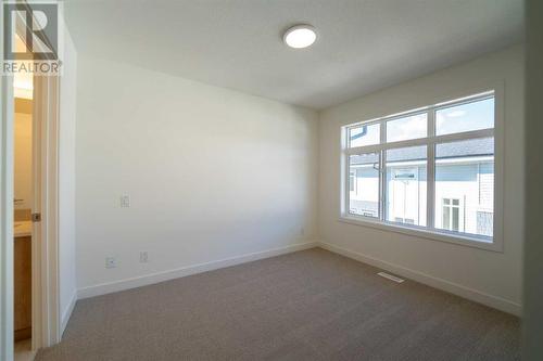 504, 857 Belmont Drive Sw, Calgary, AB - Indoor Photo Showing Other Room