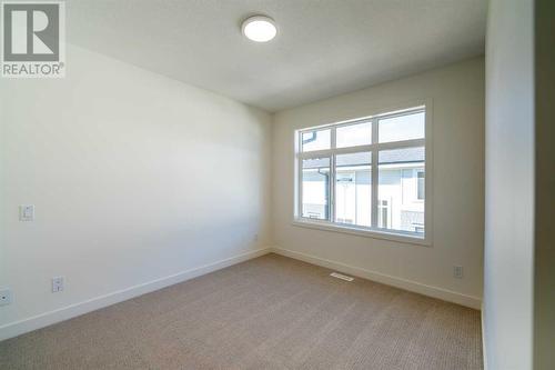 504, 857 Belmont Drive Sw, Calgary, AB - Indoor Photo Showing Other Room