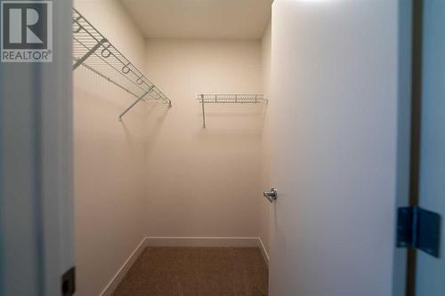 504, 857 Belmont Drive Sw, Calgary, AB - Indoor With Storage