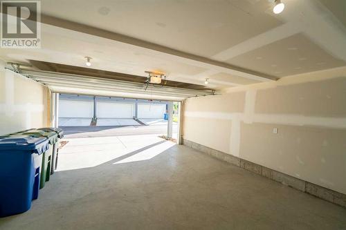 504, 857 Belmont Drive Sw, Calgary, AB - Indoor Photo Showing Garage