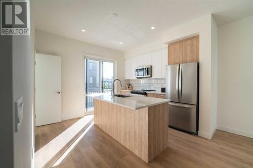 504, 857 Belmont Drive Sw, Calgary, AB - Indoor Photo Showing Kitchen