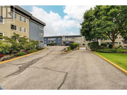 Driveway & Garage Entrance - 1045 Sutherland Avenue Unit# 302, Kelowna, BC - Outdoor