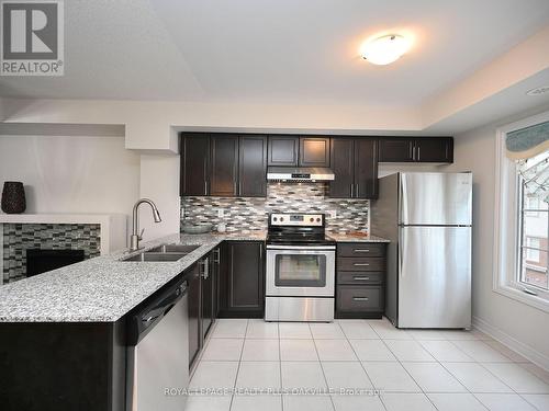 90 - 2280 Baronwood Drive, Oakville, ON - Indoor Photo Showing Kitchen With Stainless Steel Kitchen With Double Sink With Upgraded Kitchen