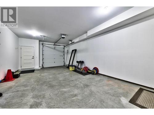 Oversiged 1 Car Garage - 1951 Qu'Appelle Boulevard Unit# 115, Kamloops, BC - Indoor Photo Showing Garage