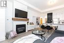 201 - 8 Wellesley Street, Toronto, ON  - Indoor Photo Showing Living Room With Fireplace 