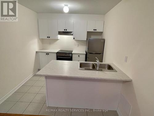 Unit 1 - 10 Bannister Road, Barrie, ON - Indoor Photo Showing Kitchen With Double Sink