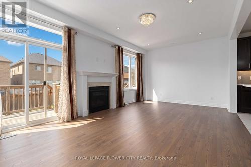 18 Rising Hill Ridge E, Brampton, ON - Indoor Photo Showing Living Room With Fireplace