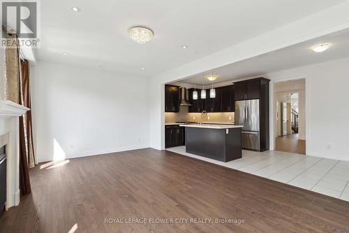 18 Rising Hill Ridge E, Brampton, ON - Indoor Photo Showing Kitchen With Fireplace