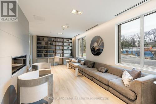 605 - 42 Mill Street, Halton Hills, ON - Indoor Photo Showing Living Room With Fireplace