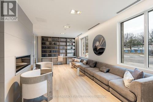 605 - 42 Mill Street, Halton Hills, ON - Indoor Photo Showing Living Room With Fireplace