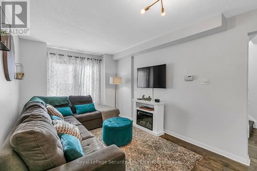 64 Natale Court, Bradford West Gwillimbury, ON - Indoor Photo Showing Living Room With Fireplace