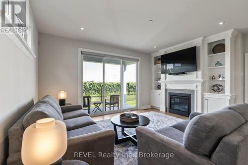 4 - 1849 Four Mile Creek Road, Niagara-On-The-Lake, ON - Indoor Photo Showing Living Room With Fireplace