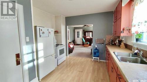 1341 105Th Street, North Battleford, SK - Indoor Photo Showing Kitchen With Double Sink