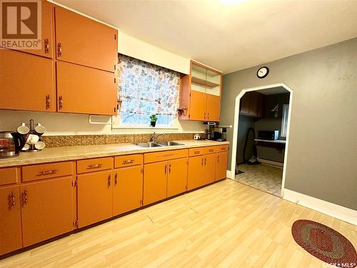 1341 105Th Street, North Battleford, SK - Indoor Photo Showing Kitchen With Double Sink