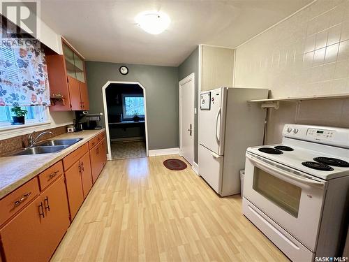 1341 105Th Street, North Battleford, SK - Indoor Photo Showing Kitchen With Double Sink