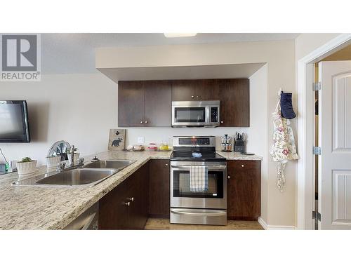 9212 86 Street, Fort St. John, BC - Indoor Photo Showing Kitchen With Double Sink