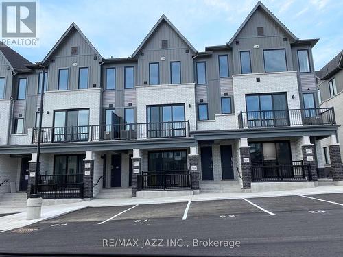 702 - 160 Densmore Road, Cobourg, ON - Outdoor With Balcony With Facade