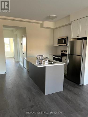 702 - 160 Densmore Road, Cobourg, ON - Indoor Photo Showing Kitchen With Stainless Steel Kitchen