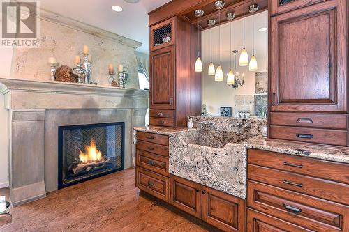 Primary ensuite w/ fireplace - 1180 Stoneypointe Court, Kelowna, BC - Indoor With Fireplace