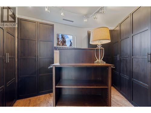 Primary Walk-In Closet - 1180 Stoneypointe Court, Kelowna, BC - Indoor Photo Showing Other Room