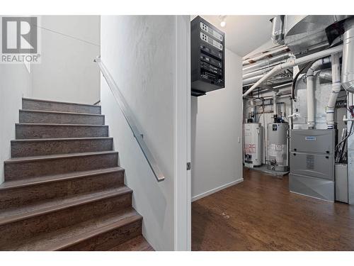 Mechanicals and entry stairwell, main - 1180 Stoneypointe Court, Kelowna, BC - Indoor Photo Showing Other Room