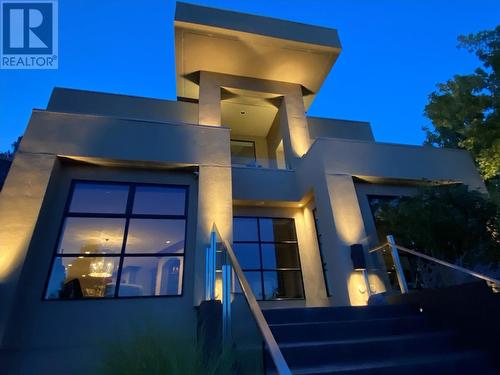 Night shot of front entry - 1180 Stoneypointe Court, Kelowna, BC - Outdoor