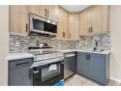 12322 95 St Nw, Edmonton, AB - Indoor Photo Showing Kitchen With Upgraded Kitchen