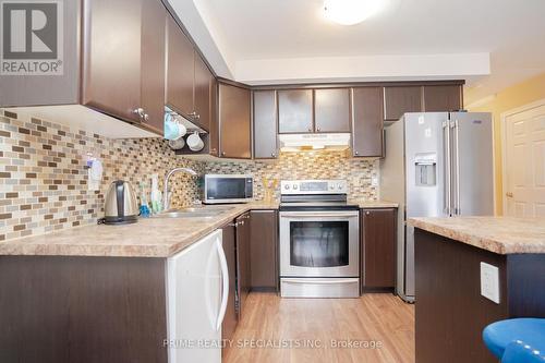 80 - 20 Mcconkey Crescent, Brant, ON - Indoor Photo Showing Kitchen With Upgraded Kitchen