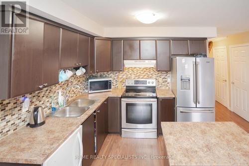 80 - 20 Mcconkey Crescent, Brant, ON - Indoor Photo Showing Kitchen With Double Sink