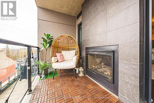 402 - 181 James Street N, Hamilton, ON - Indoor Photo Showing Living Room With Fireplace