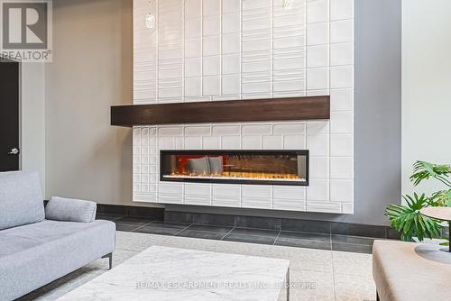 402 - 181 James Street N, Hamilton, ON - Indoor Photo Showing Living Room With Fireplace