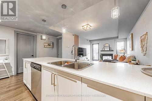 402 - 181 James Street N, Hamilton, ON - Indoor Photo Showing Kitchen With Double Sink